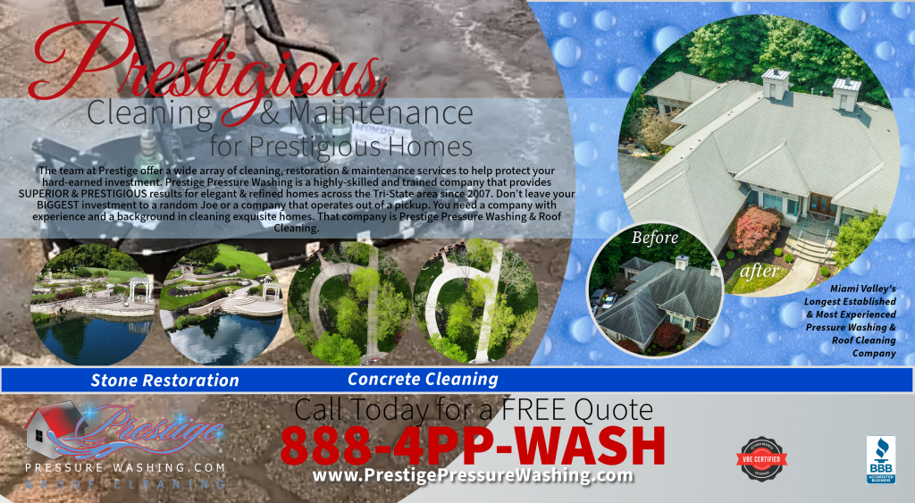 Technician pressure washing a vinyl-sided home in Dayton, Ohio during spring