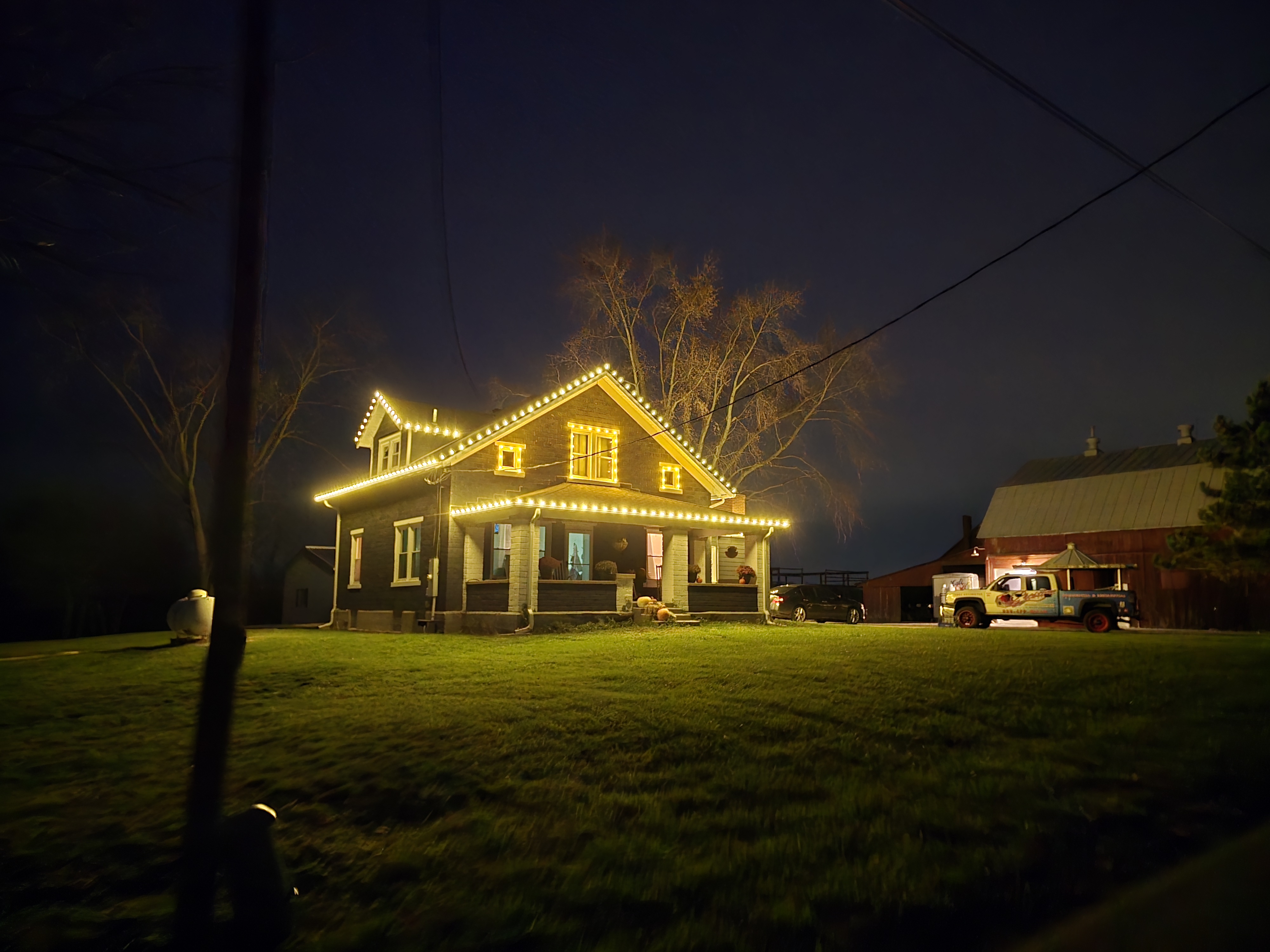 Christmas lights on two-story home