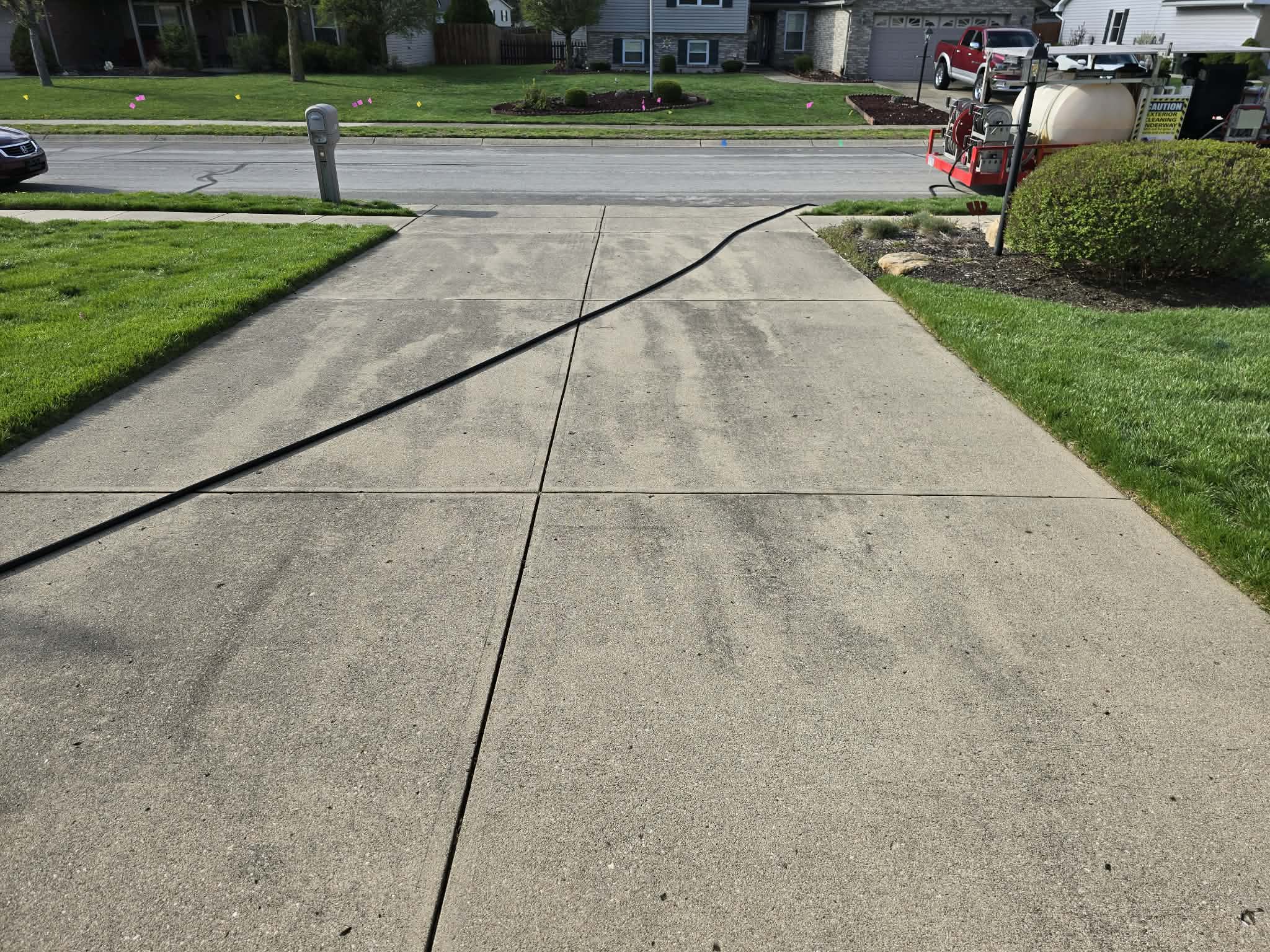 Driveway before concrete cleaning Dayton Ohio