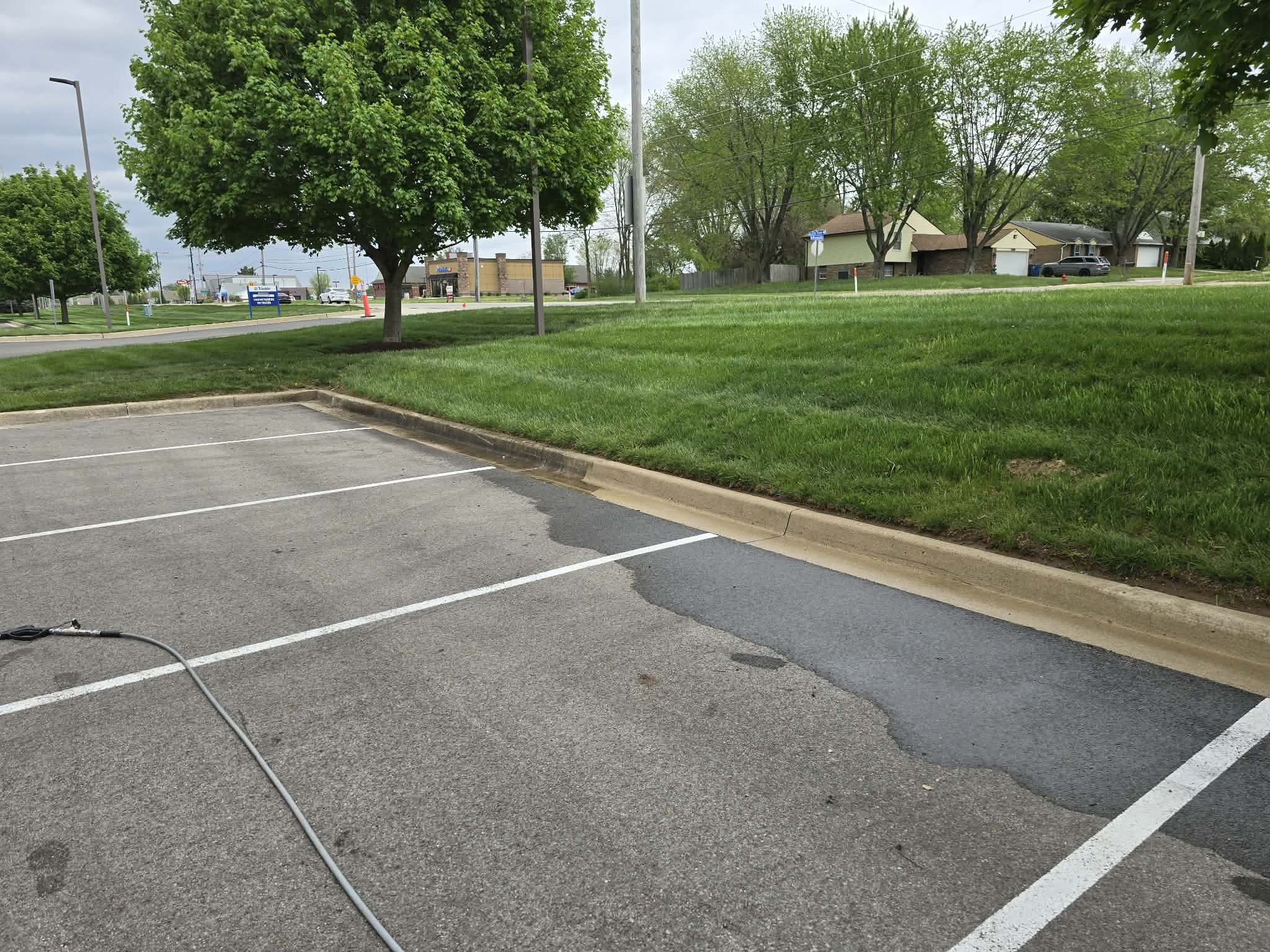 Curb cleaning in progress